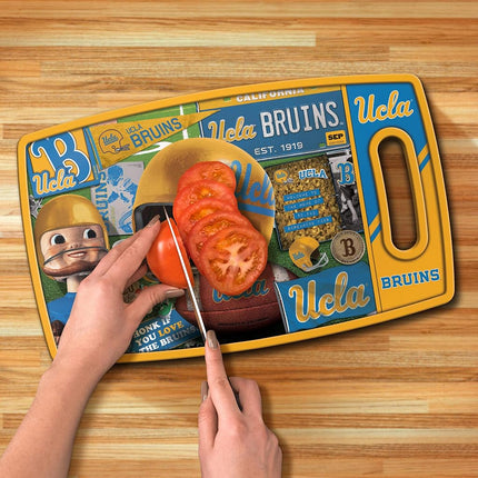 Tabla de cortar retro de los Bruins de UCLA de la NCAA de YouTheFan