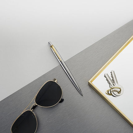 PARKER Jotter Ballpoint Pen, Stainless Steel with Golden Trim, Medium Point Blue Ink (1953206)