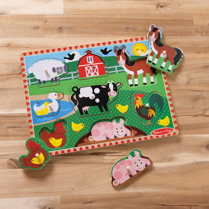 Melissa & Doug Rompecabezas de granja con clavijas