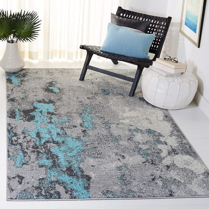 Safavieh Modern Abstract Distressed Indoor Woven Rectangle Area Rug, Adirondack Collection, ADR134, in Turquoise / Grey, 91 X 152 cm for Living Room, Bedroom or Any Indoor Space